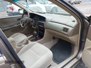 2000 Nissan Altima XE with VIN 1N4DL01D0YC181174, listed as a IAAI auction lot 41798721 with 119,682 mi miles. Bid and sale history available at carsss.com. Image 5.