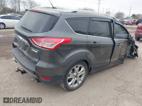 2016 Ford Escape Titanium with VIN 1FMCU0J9XGUC58149, listed as a IAAI auction lot 41739005 with 111,594 mi miles. Bid and sale history available at carsss.com. Image 4.
