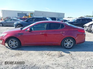 2013 Kia Optima EX with VIN 5XXGN4A72DG165295, listed as a IAAI auction lot 41269214 with 167,001 mi miles. Bid and sale history available at carsss.com. Image 14.