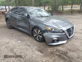 2019 Nissan Altima SL z VIN 1N4BL4EV4KC256015, wystawiony jako IAAI lot #42041439 z przebiegiem 104 888 mil mil oraz . Historia ofert i sprzedaży dostępna na DreamBid. Obrazek 1.