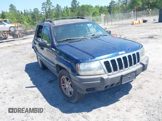 2003 Jeep Grand Cherokee Laredo z VIN 1J4GW48S83C542499, wystawiony jako IAAI lot #42131390 z przebiegiem Nie podano mil oraz . Historia ofert i sprzedaży dostępna na DreamBid. Obrazek 1.