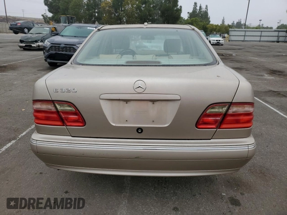 2002 Mercedes-Benz E-Class with VIN WDBJF65J92B404315, listed as a Copart auction lot 75481094 with 87,383 mi miles and Salvage Title. Bid and sale history available at carsss.com. Image 6.