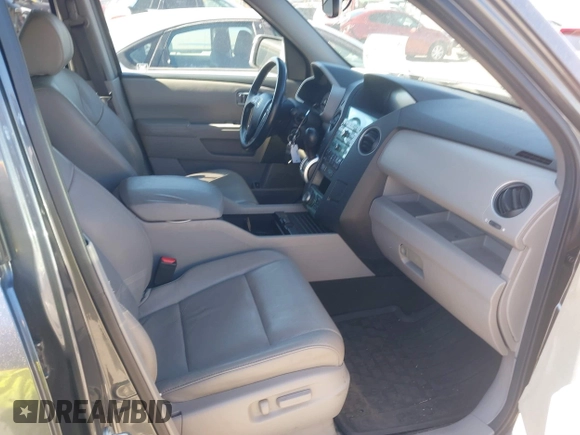 2010 Honda Pilot Touring with VIN 5FNYF4H94AB031167, listed as a IAAI auction lot 41800738 with 184,126 mi miles and . Bid and sale history available at carsss.com. Image 5.