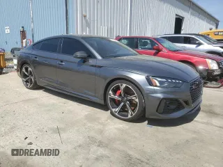 2023 Audi RS 5 Sportback z VIN WUAAWCF55PA902979, wystawiony jako Copart lot #54194715 z przebiegiem 9 576 mil mil oraz Szkoda całkowita • Salvage title. Historia ofert i sprzedaży dostępna na DreamBid. Obrazek 4.