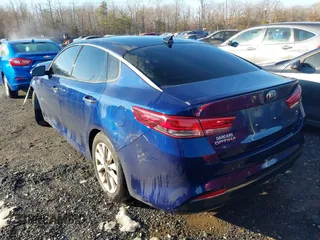 2018 Kia Optima LX with VIN 5XXGT4L3XJG242796, listed as a IAAI auction lot 41181640 with 128,344 mi miles. Bid and sale history available at carsss.com. Image 3.
