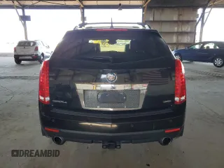 2012 Cadillac SRX Premium Collection z VIN 3GYFNFE30CS599863, wystawiony jako Copart lot #61249995 z przebiegiem 144 740 mil mil oraz Czysty tytuł • Clean title. Historia ofert i sprzedaży dostępna na DreamBid. Obrazek 6.