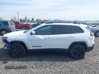 2019 Jeep Cherokee Latitude Plus with VIN 1C4PJMLX2KD432659, listed as a IAAI auction lot 42011291 with 76,015 mi miles. Bid and sale history available at carsss.com. Image 15.