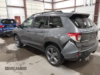 2019 Honda Passport Touring with VIN 5FNYF8H98KB007933, listed as a IAAI auction lot 41953263 with 87,614 mi miles and . Bid and sale history available at DreamBid. Image 3.