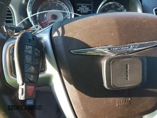 2011 Chrysler Town & Country Limited with VIN 2A4RR6DG4BR716460, listed as a IAAI auction lot 41073221 with 136,779 mi miles. Bid and sale history available at carsss.com. Image 11.