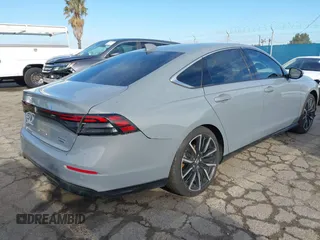 2023 Honda Accord Touring with VIN 1HGCY2F81PA035053, listed as a IAAI auction lot 41807628 with 57,422 mi miles and . Bid and sale history available at DreamBid. Image 4.
