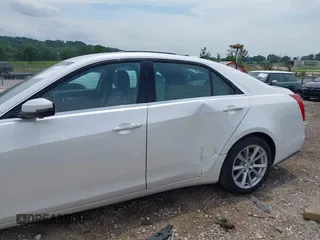 2019 Cadillac CTS RWD with VIN 1G6AP5SXXK0109823, listed as a IAAI auction lot 42401514 with 64,635 mi miles and . Bid and sale history available at DreamBid. Image 6.