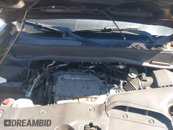 2010 Honda Pilot Touring with VIN 5FNYF3H84AB022700, listed as a IAAI auction lot 41689783 with 170,972 mi miles and . Bid and sale history available at DreamBid. Image 10.
