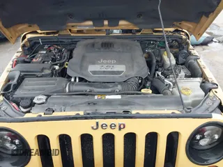 2013 Jeep Wrangler Rubicon 10th Anniversary with VIN 1C4BJWCG5DL688504, listed as a IAAI auction lot 41797184 with 109,414 mi miles and . Bid and sale history available at DreamBid. Image 10.