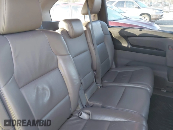 2013 Honda Odyssey EX-L with VIN 5FNRL5H64DB034860, listed as a IAAI auction lot 42013204 with 104,314 mi miles and . Bid and sale history available at carsss.com. Image 8.