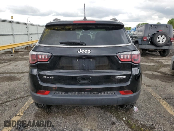 2017 Jeep Compass Latitude z VIN 3C4NJDBB1HT650771, wystawiony jako Copart lot #58190405 z przebiegiem 93 470 mil mil oraz Szkoda całkowita • Salvage title. Historia ofert i sprzedaży dostępna na DreamBid. Obrazek 6.