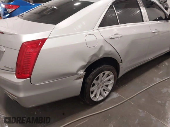 2014 Cadillac CTS Luxury AWD with VIN 1G6AX5SX3E0181029, listed as a IAAI auction lot 41895745 with 68,799 mi miles and . Bid and sale history available at DreamBid. Image 6.