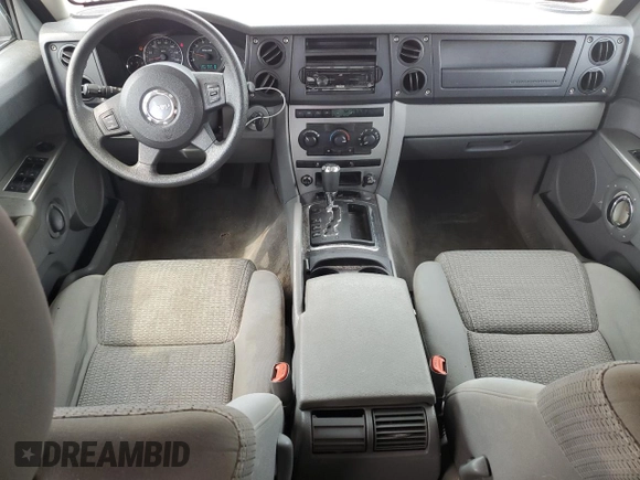 2006 Jeep Commander z VIN 1J8HG48K76C131681, wystawiony jako Copart lot #64386985 z przebiegiem 142 135 mil mil oraz Szkoda całkowita • Salvage title. Historia ofert i sprzedaży dostępna na DreamBid. Obrazek 8.