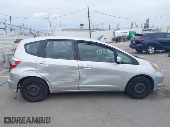 2013 Honda Fit with VIN JHMGE8H38DC002109, listed as a IAAI auction lot 42067257 with 305,739 mi miles. Bid and sale history available at carsss.com. Image 13.