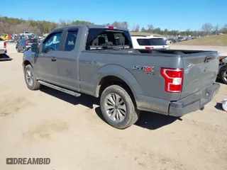 2018 Ford F-150 XL with VIN 1FTEX1EP7JFB50666, listed as a IAAI auction lot 41693673 with 149,570 mi miles. Bid and sale history available at carsss.com. Image 3.