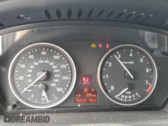 2012 BMW X5 35i with VIN 5UXZV4C50CL991452, listed as a Copart auction lot 56890265 with 147,019 mi miles and Salvage title. Bid and sale history available at DreamBid. Image 9.
