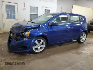 2014 Chevrolet Sonic LTZ z VIN 1G1JE6SB0E4220576, wystawiony jako Copart lot #43913905 z przebiegiem 79 921 mil mil oraz Czysty tytuł • Clean title. Historia ofert i sprzedaży dostępna na DreamBid. Obrazek 1.