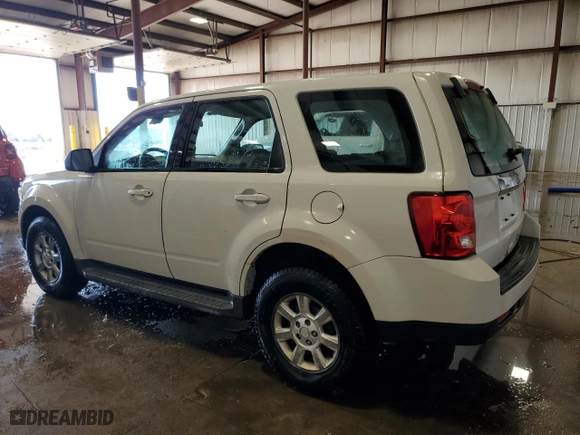 2010 Mazda Tribute Touring with VIN 4F2CY9C72AKM09576, listed as a Copart auction lot 47435435 with 159,721 mi miles and Salvage Title. Bid and sale history available at carsss.com. Image 2.