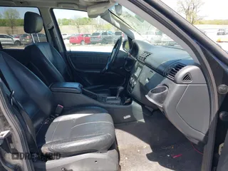 2004 Mercedes-Benz M 350 with VIN 4JGAB57E64A506988, listed as a IAAI auction lot 42219772 with 294,505 mi miles and . Bid and sale history available at DreamBid. Image 5.