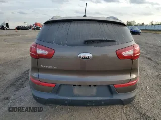 2013 Kia Sportage LX z VIN KNDPB3A23D7465413, wystawiony jako Copart lot #83694894 z przebiegiem 122 467 mil mil oraz Szkoda całkowita • Salvage title. Historia ofert i sprzedaży dostępna na DreamBid. Obrazek 6.