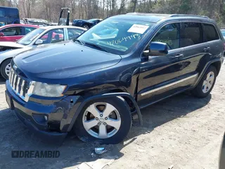 2013 Jeep Grand Cherokee Laredo with VIN 1C4RJFAG1DC592371, listed as a IAAI auction lot 42064993 with 136,154 mi miles. Bid and sale history available at carsss.com. Image 17.