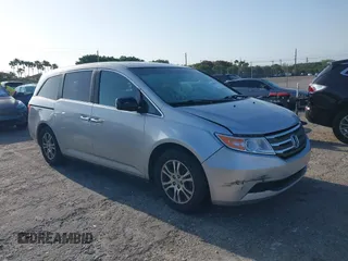 2013 Honda Odyssey EX-L with VIN 5FNRL5H67DB008575, listed as a IAAI auction lot 42008315 with 131,984 mi miles and . Bid and sale history available at carsss.com. Image 1.