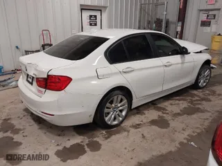 2014 BMW 3 Series 328i xDrive with VIN WBA3B3G52ENR81756, listed as a IAAI auction lot 41714588 with 122,678 mi miles. Bid and sale history available at carsss.com. Image 4.