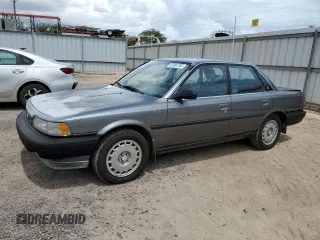 1990 Toyota Camry z VIN JT2VV21E2L0114723, wystawiony jako Copart lot #53584755 z przebiegiem 58 986 mil mil oraz Czysty tytuł • Clean title. Historia ofert i sprzedaży dostępna na DreamBid. Obrazek 1.