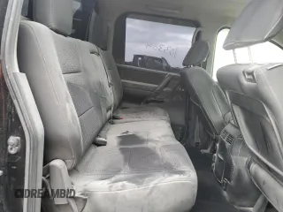 2013 Nissan Titan S with VIN 1N6AA0EC1DN302813, listed as a Copart auction lot 76369234 with 103,304 mi miles and Salvage Title. Bid and sale history available at DreamBid. Image 10.
