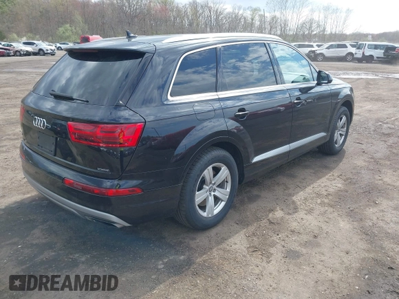2019 Audi Q7 Premium with VIN WA1AHAF74KD034469, listed as a IAAI auction lot 42037259 with 92,404 mi miles and . Bid and sale history available at DreamBid. Image 4.