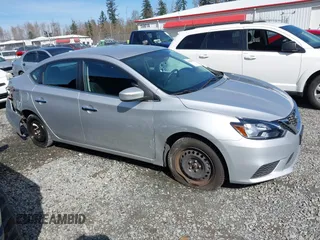 2018 Nissan Sentra S with VIN 3N1AB7AP6JY292055, listed as a IAAI auction lot 41883754 with 65,703 mi miles and . Bid and sale history available at DreamBid. Image 14.