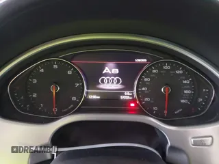 2012 Audi A8 with VIN WAUAVAFD9CN006499, listed as a IAAI auction lot 42461402 with 57,232 mi miles and . Bid and sale history available at DreamBid. Image 7.