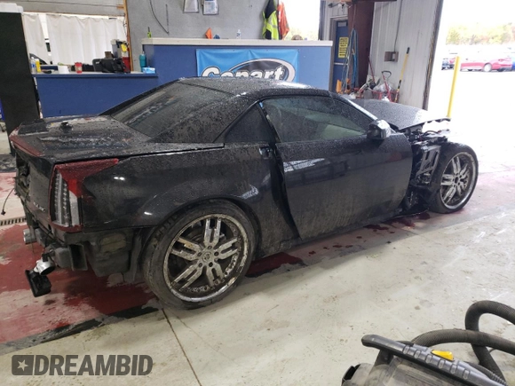 2005 Cadillac XLR z VIN 1G6YV34AX55601101, wystawiony jako Copart lot #75821644 z przebiegiem Nie podano mil oraz Szkoda całkowita • Salvage title. Historia ofert i sprzedaży dostępna na DreamBid. Obrazek 3.
