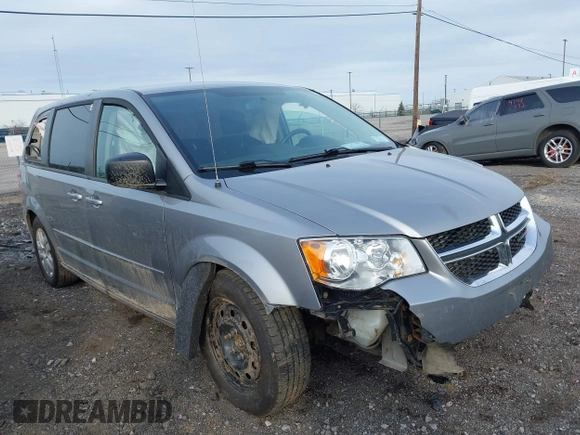 2015 Dodge Grand Caravan SE with VIN 2C4RDGBG8FR612296, listed as a IAAI auction lot 42112920 with 137,023 mi miles and . Bid and sale history available at DreamBid. Image 1.