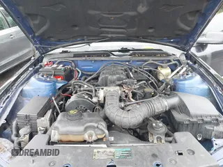 2005 Ford Mustang Deluxe z VIN 1ZVFT80N655234887, wystawiony jako IAAI lot #42521363 z przebiegiem 164 011 mil mil oraz . Historia ofert i sprzedaży dostępna na DreamBid. Obrazek 10.