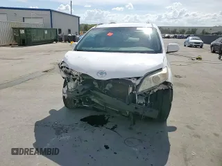 2014 Toyota Sienna LE AAS z VIN 5TDKK3DC1ES468896, wystawiony jako Copart lot #60520405 z przebiegiem 239 779 mil mil oraz Szkoda całkowita • Salvage title. Historia ofert i sprzedaży dostępna na DreamBid. Obrazek 14.