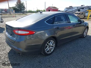 2016 Ford Fusion SE with VIN 3FA6P0HD6GR260805, listed as a IAAI auction lot 42100214 with 108,438 mi miles. Bid and sale history available at carsss.com. Image 4.