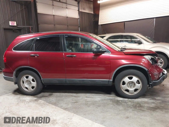 2009 Honda CR-V LX with VIN JHLRE48339C018957, listed as a IAAI auction lot 41952951 with 76,502 mi miles. Bid and sale history available at carsss.com. Image 13.