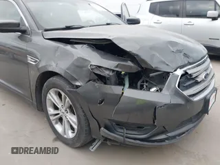 2015 Ford Taurus SEL with VIN 1FAHP2E8XFG161616, listed as a IAAI auction lot 42049199 with 138,565 mi miles and . Bid and sale history available at carsss.com. Image 6.
