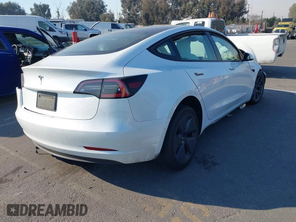2022 Tesla Model 3 with VIN 5YJ3E1EA4NF319237, listed as a IAAI auction lot 41263761 with 44,384 mi miles and . Bid and sale history available at DreamBid. Image 4.