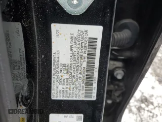 2022 Honda Civic LX z VIN 19XFL2H58NE005054, wystawiony jako Copart lot #80970294 z przebiegiem 65 073 mil mil oraz Szkoda całkowita • Salvage title. Historia ofert i sprzedaży dostępna na DreamBid. Obrazek 14.