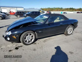 2002 Jaguar XK with VIN SAJDA42CX2NA30629, listed as a Copart auction lot 76191434 with Not Provided miles and Salvage Title. Bid and sale history available at DreamBid. Image 1.