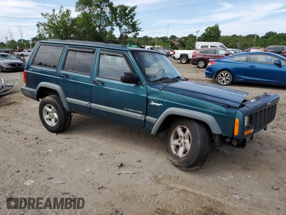 1998 Jeep Cherokee Sport z VIN 1J4FJ68S4WL101110, wystawiony jako Copart lot #57696755 z przebiegiem 218 254 mil mil oraz Szkoda całkowita • Salvage title. Historia ofert i sprzedaży dostępna na DreamBid. Obrazek 4.