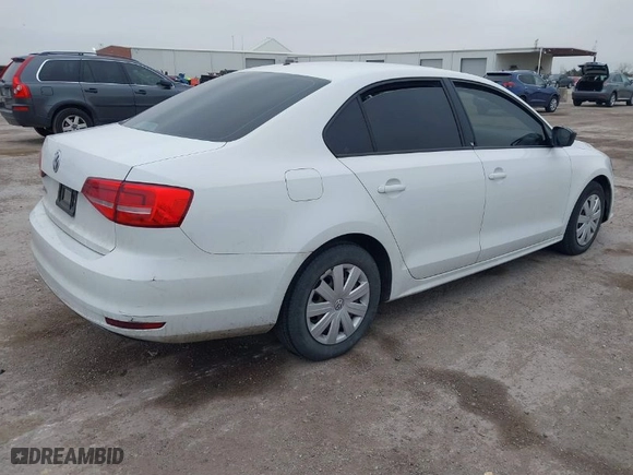 2015 Volkswagen Jetta Sedan 2.0L S with VIN 3VW2K7AJ1FM404527, listed as a IAAI auction lot 41404880 with 142,699 mi miles. Bid and sale history available at carsss.com. Image 4.