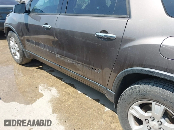 2011 GMC Acadia SL with VIN 1GKKRNED2BJ297121, listed as a IAAI auction lot 42128170 with 130,205 mi miles and . Bid and sale history available at carsss.com. Image 6.