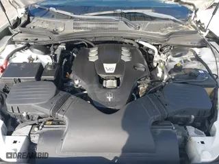 2015 Maserati Ghibli with VIN ZAM57XSA6F1156252, listed as a IAAI auction lot 41530186 with 84,417 mi miles. Bid and sale history available at carsss.com. Image 10.